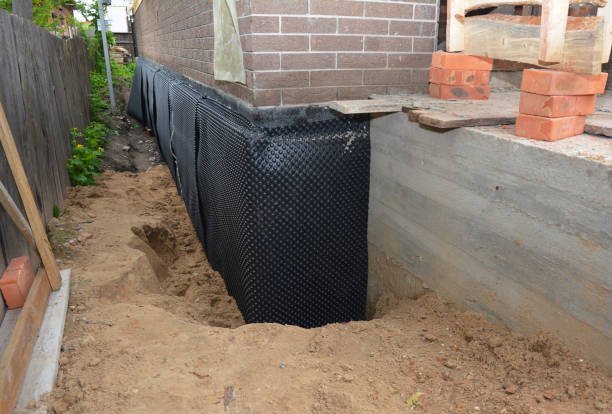 SJ Waterproofing Pros technician performing targeted Foundation Crack Repair assessment in Arnold, MD
